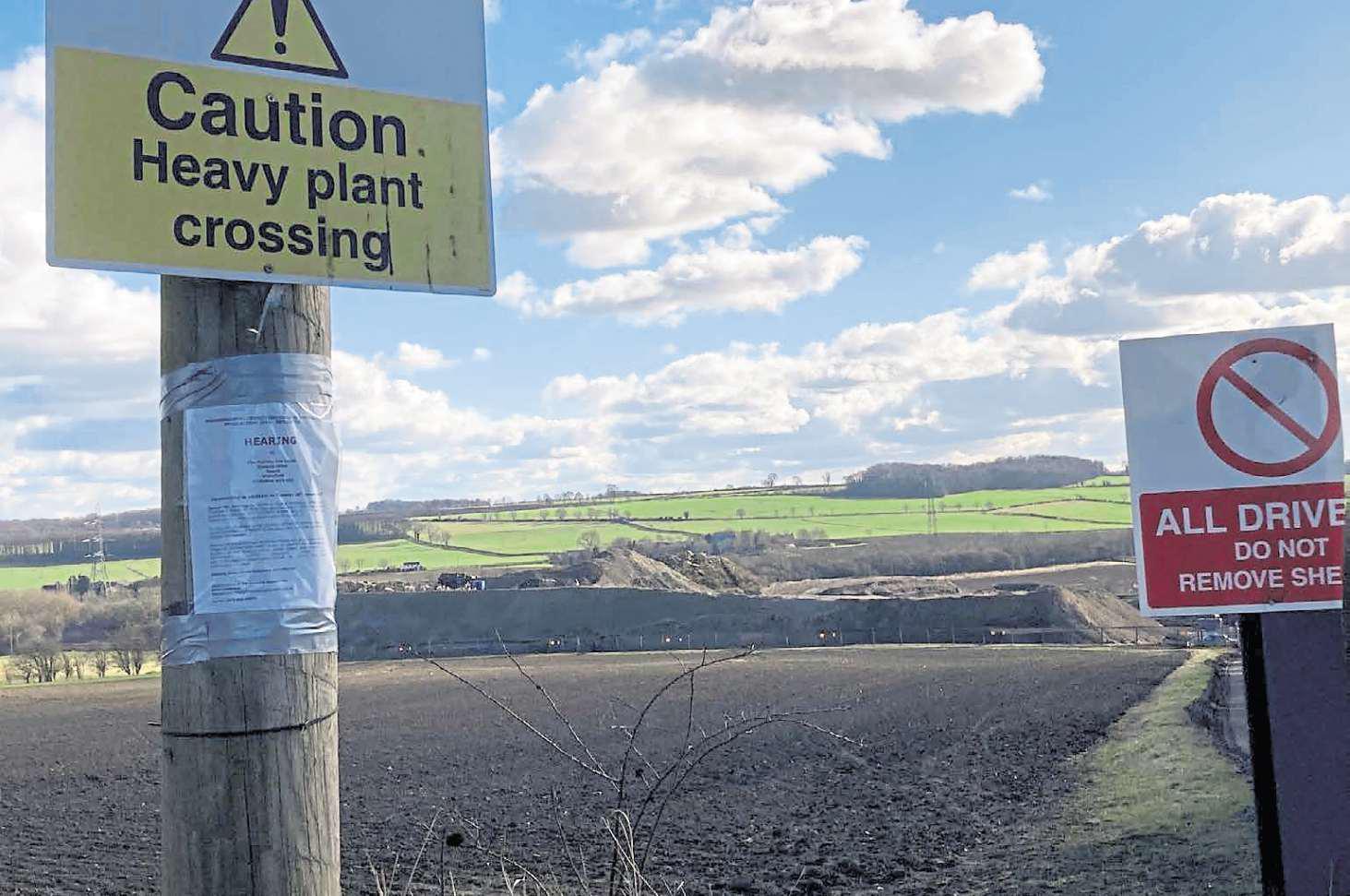 Order to clear 'stinking' waste site over 'risk to human health'