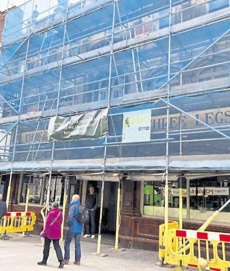 City centre pub covered in scaffolding for works