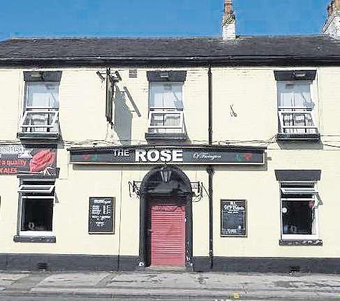 Police hold youth after fire breaks out at former pub