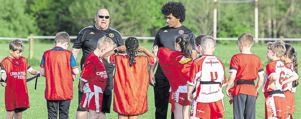 Coaches help young players show some Warrior spirit