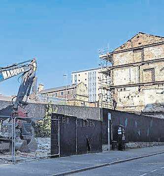 Dangerous building in city centre being demolished