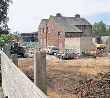 Investigation under way into former bank site