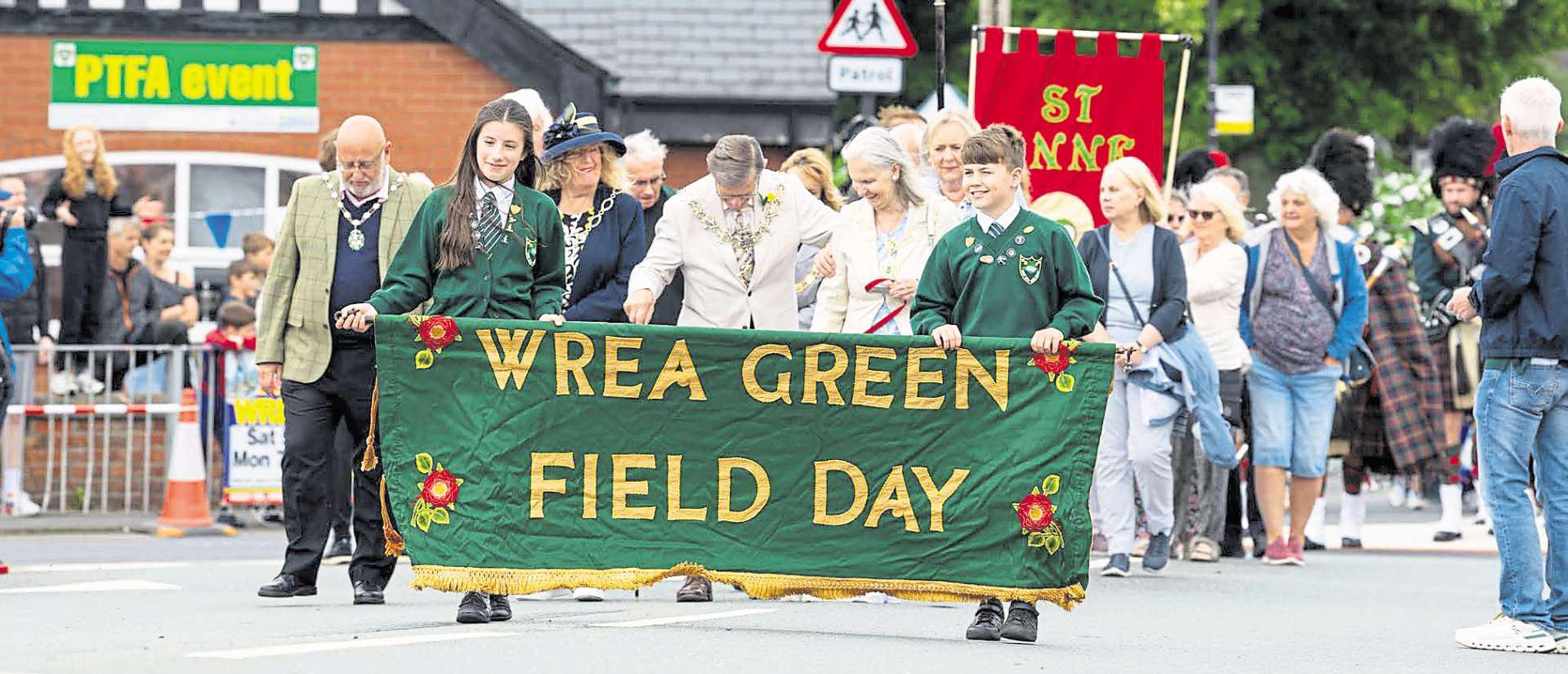 Petals and pomp at village parade