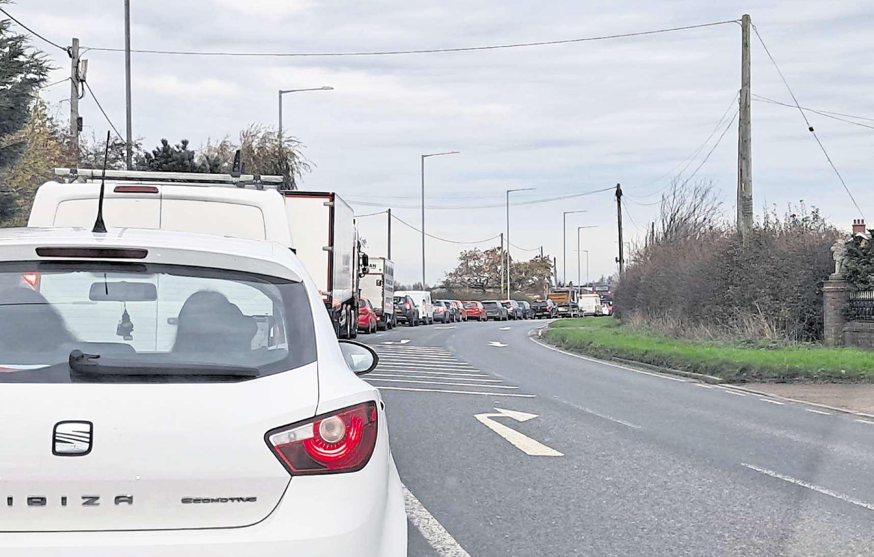 Calls to override traffic lights as delays hit major route near city