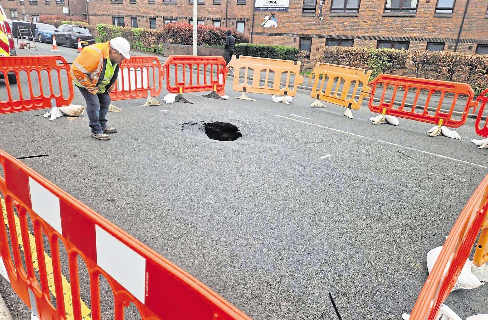 Road closed due to sinkhole which 'may increase in size'