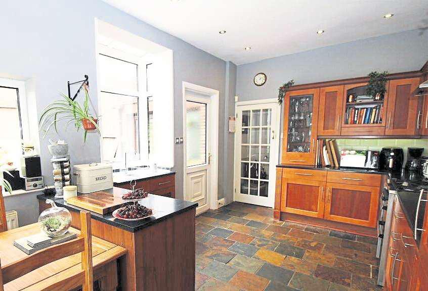 This lovely family home offers views of the seaside and the fells