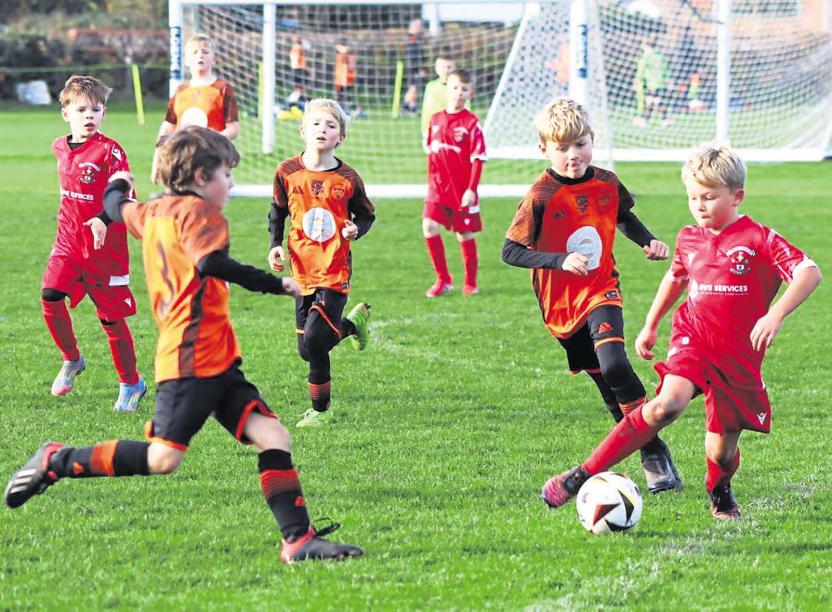 Two sets of young players reaping the rewards of competitive football