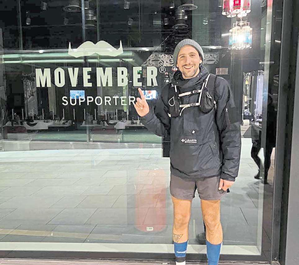 Runner battles storm and injury to raise vital cash