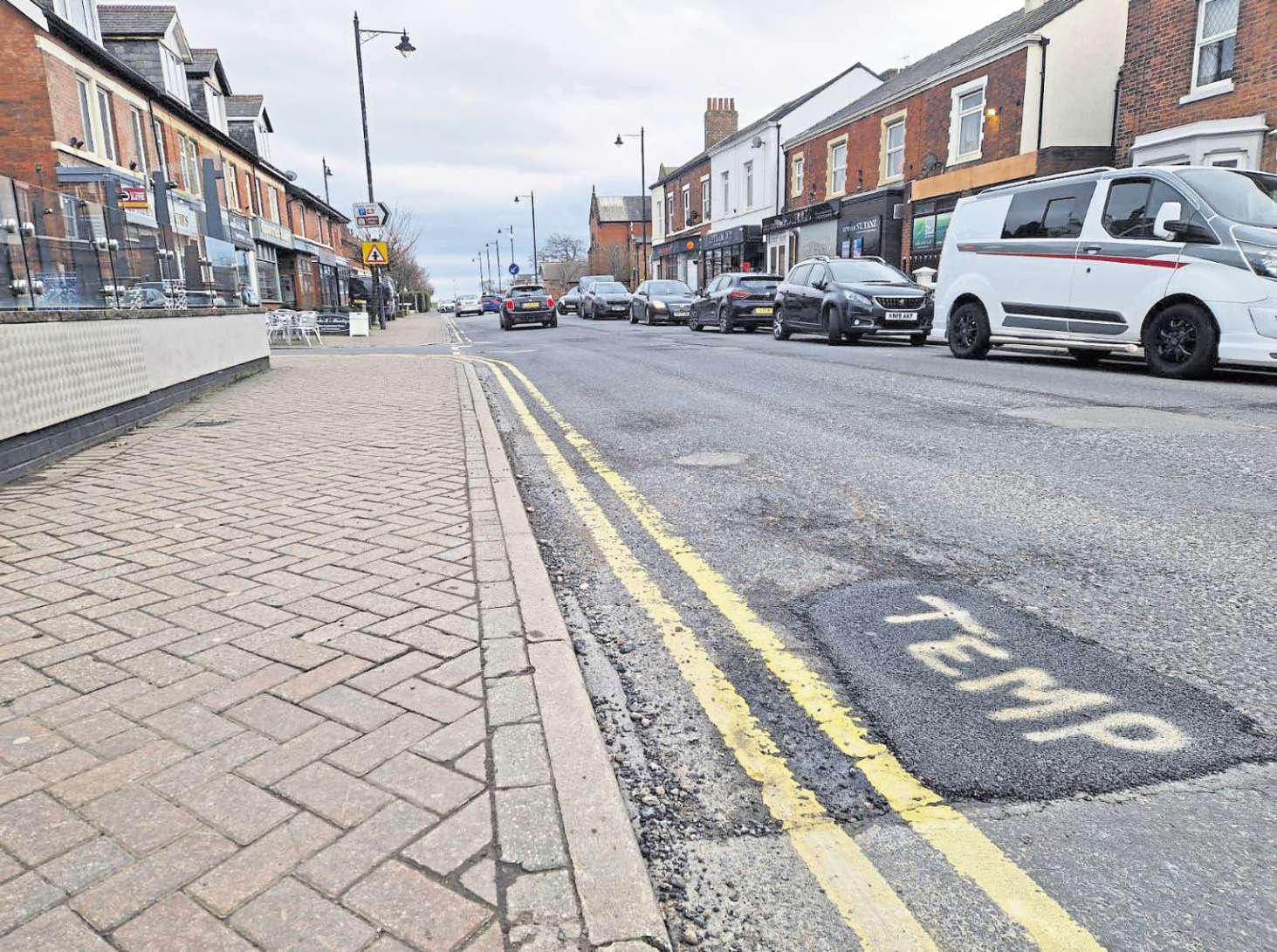 'Moon crater' pothole fixed in urgent repairs