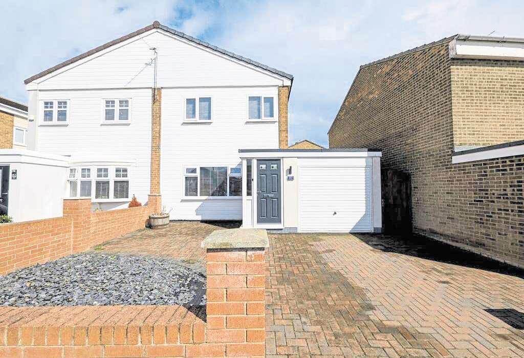 An ideal life by the sea awaits in this spacious three-bed home