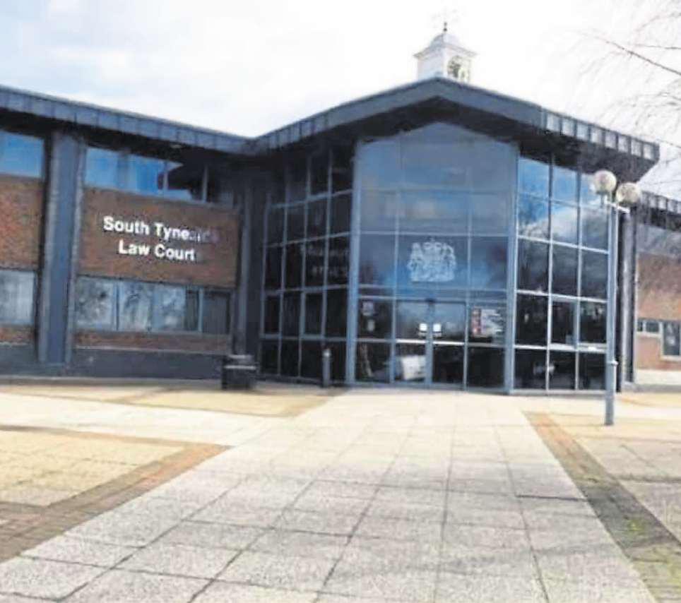 Police found man in cupboard after breaching order