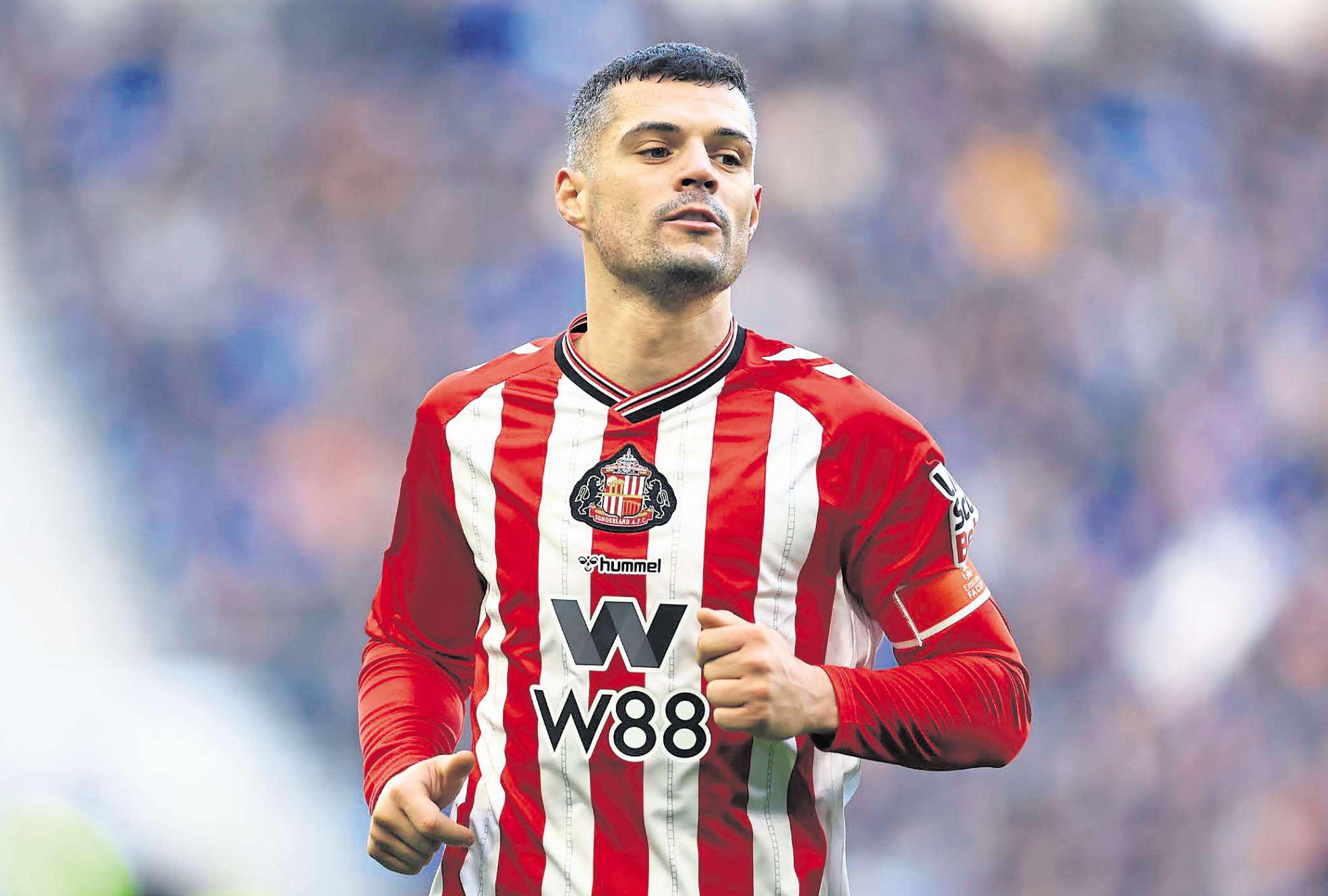 Xhaka shows his support for Mundle after 'appalling' online racist abuse