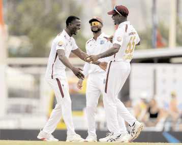 Wickets tumble as Australia routed for 180 by West Indies in Barbados test