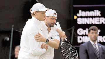 Jannik Sinner reaches the Wimbledon quarterfinals despite a bad elbow when an injured Dimitrov stops