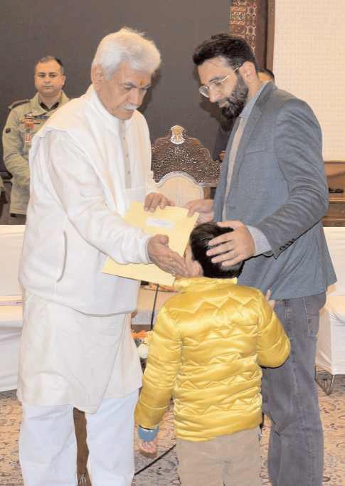 Lieutenant Governor meets the families of Nowgam's accidental blast martyrs and hands over appointment letters on compassionate grounds