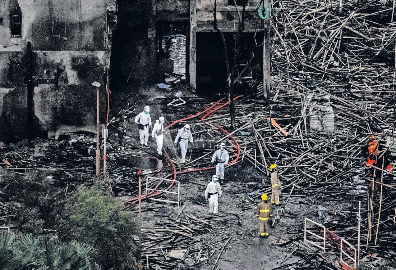Hong Kong Inferno Spread Silently Among the Towers