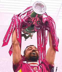 Liverpool raise trophy at Anfield