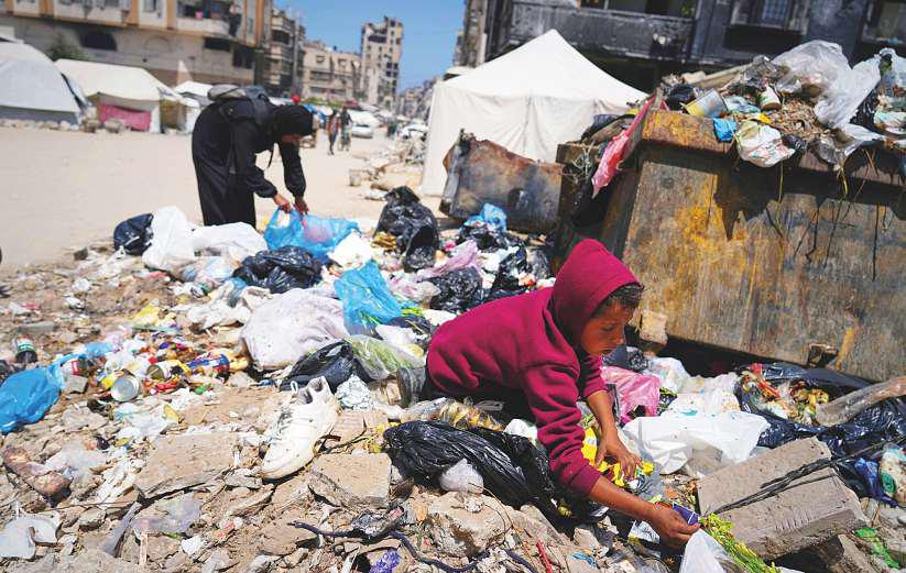 Gaza graduate and her family forced to seek food in trash