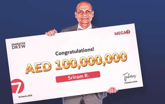 How does Dh100m Emirates Draw winner get his money?