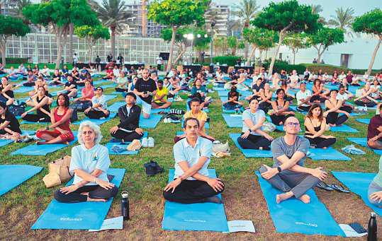 Community events, glamour, puppies mark Yoga Day in UAE