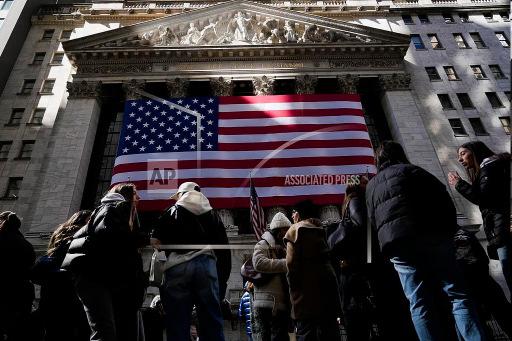 Wall Street opens higher following a stronger- than-expected report on the US job market