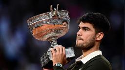 Alcaraz produces another major comeback to win French Open final in five-set thriller against Sinner