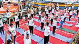 NTR district sets record with floating yoga on Krishna