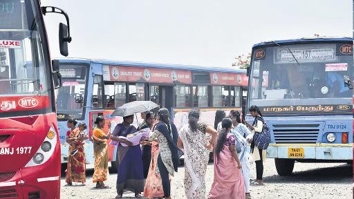 Bereft of cover, people face the elements at Redhills bus stand