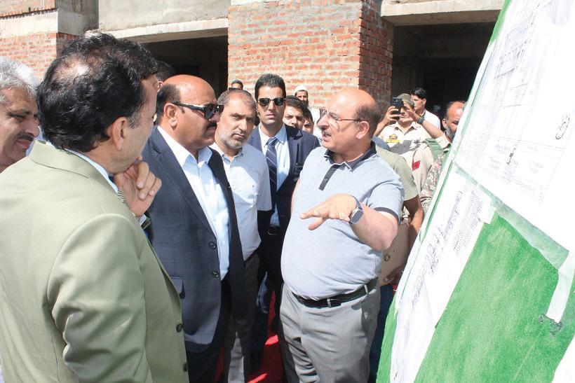 Dy CM inspects progress on 250 bedded IPD, Lab block in SKIMS Srinagar