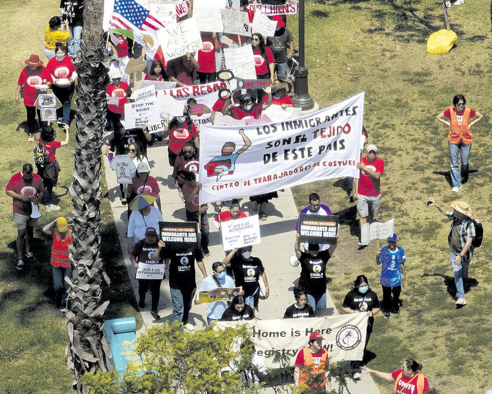 Labor groups ‘take back MacArthur Park’ to protest ICE actions