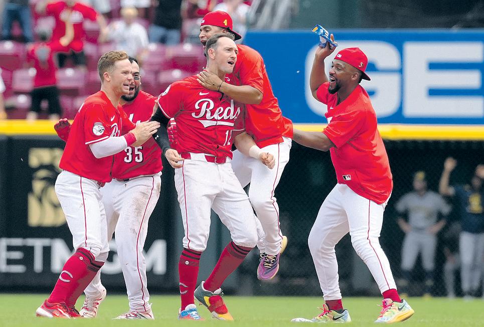Brewers’ record 14-game winning streak ended by the Reds