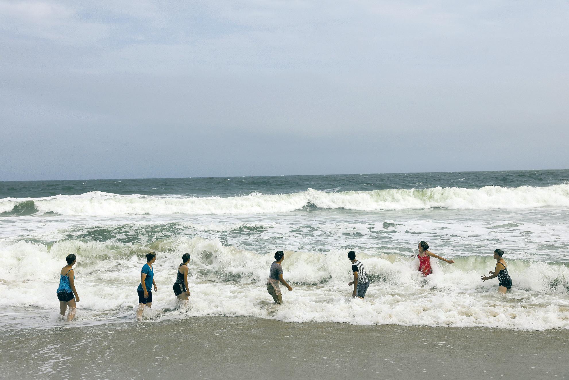 Hurricane Erin picks up steam as it edges along the East Coast