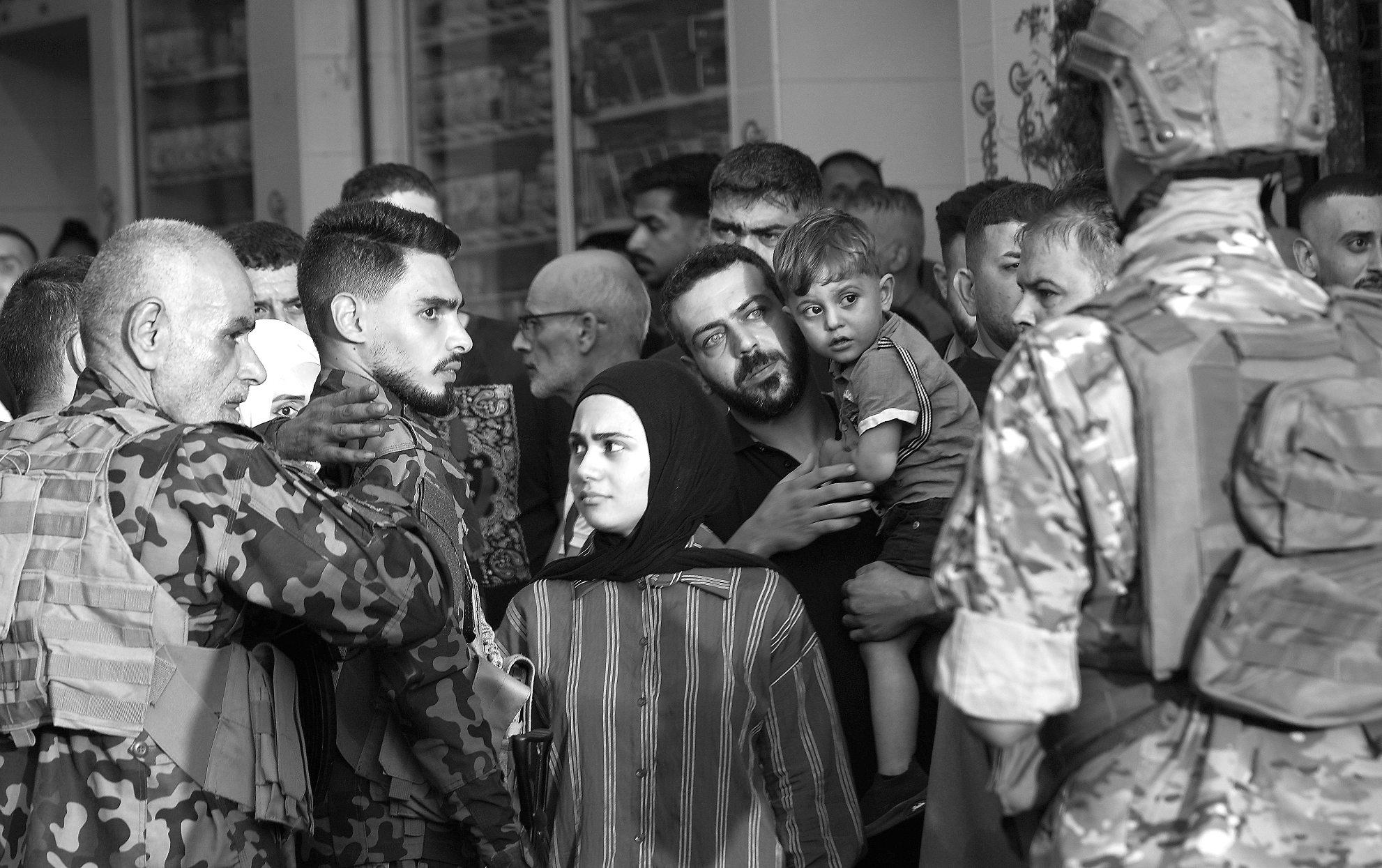 Palestinian factions in Beirut begin handing over weapons at camp