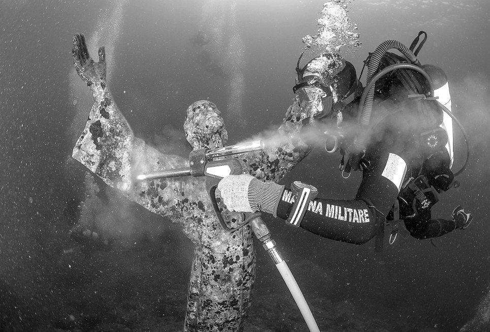 Divers pressure-wash popular underwater statue of Christ