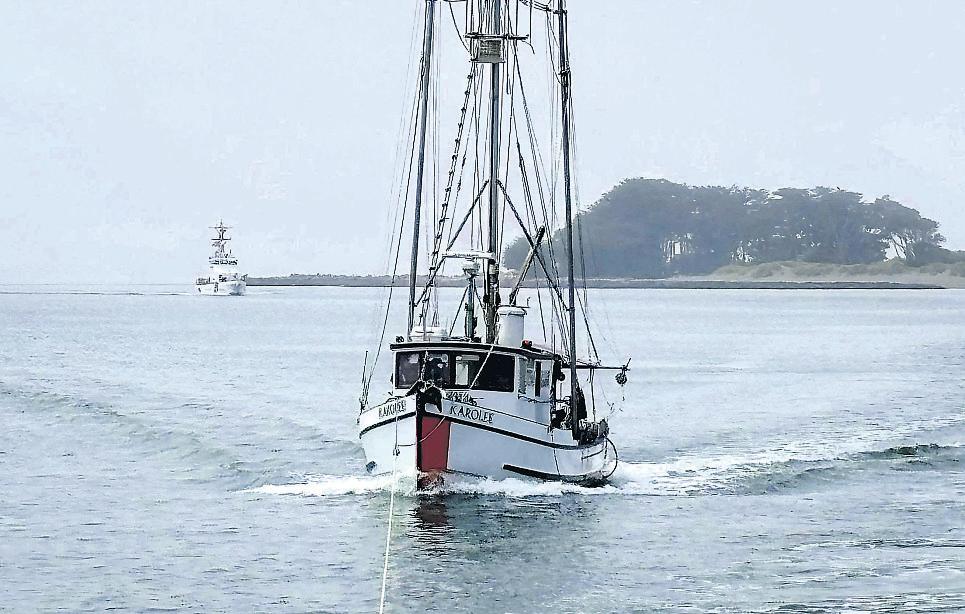 Where is the captain of this fishing boat?