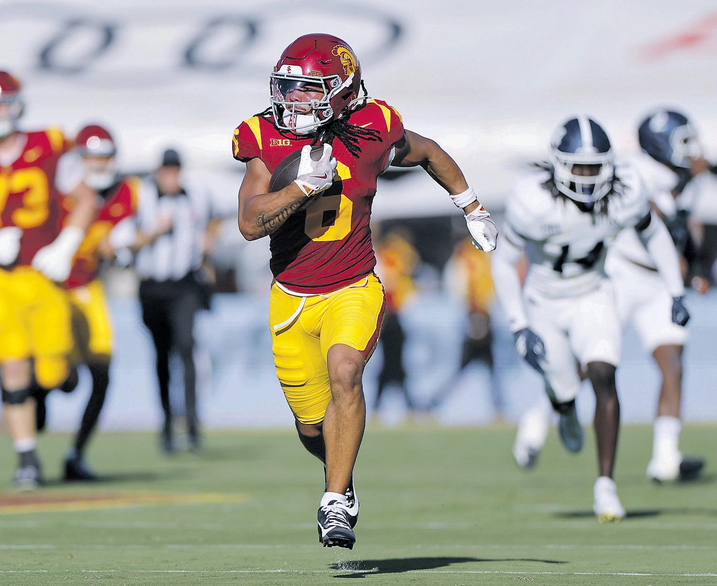 Maiava leads Trojans in rout of Helton's Eagles