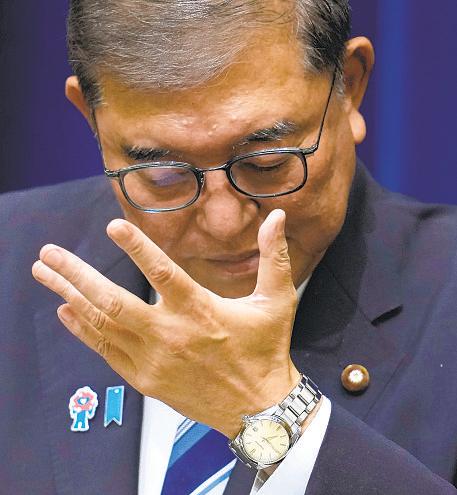 Japanese premier will resign after historic election defeat