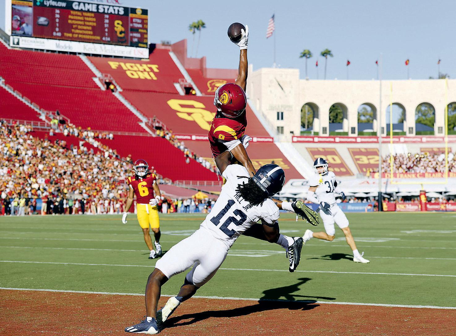 Trojans rack up 755 yards in rout — yet doubts remain