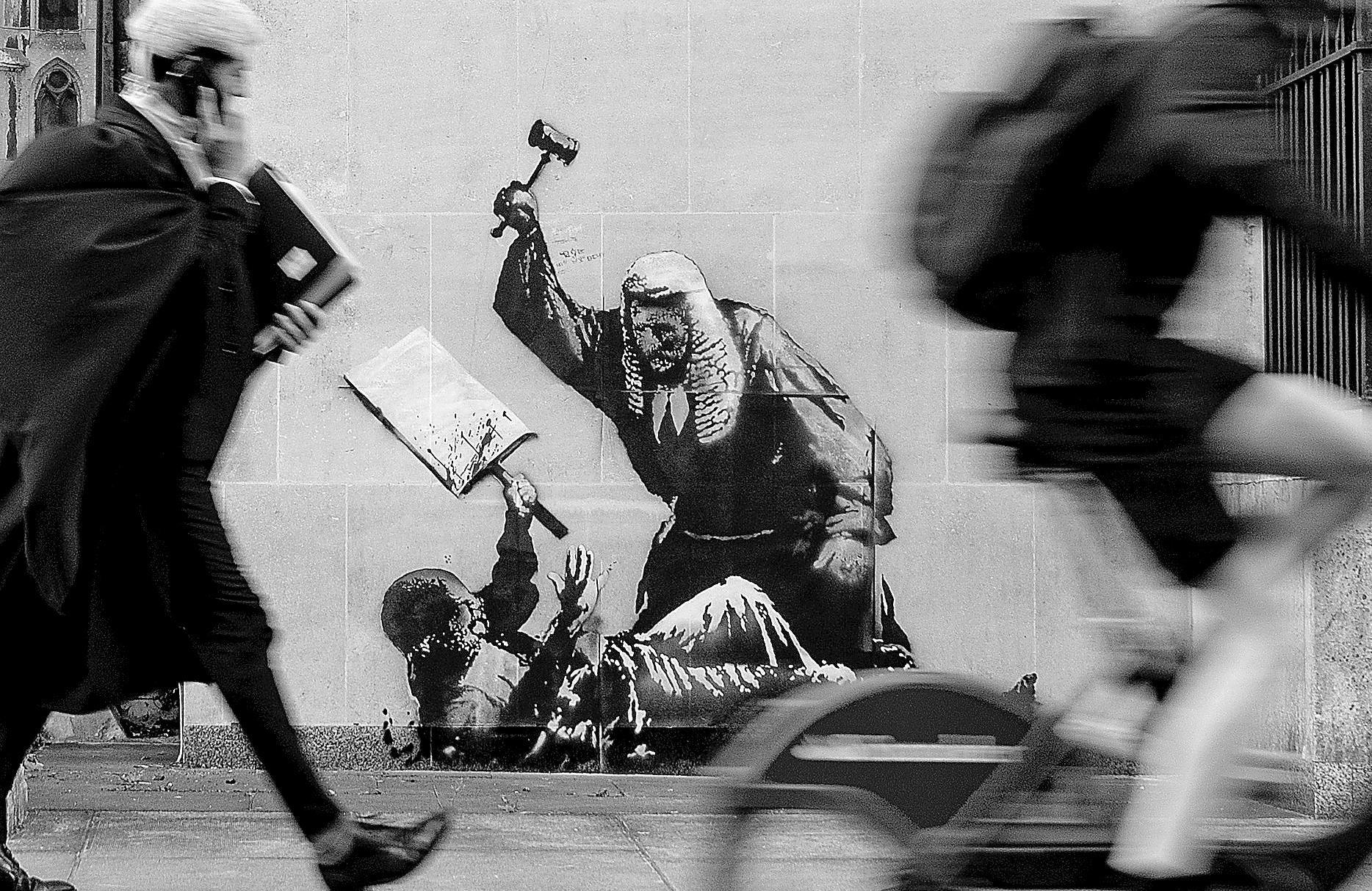 Banksy unveils new mural outside London court
