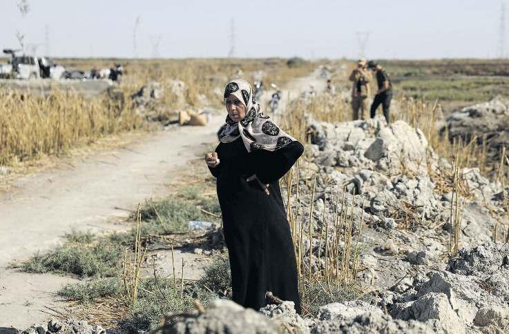 At a mass grave in Syria, families learn the fate of missing loved ones