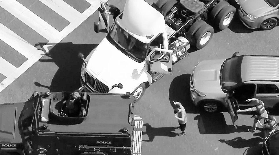 Armored vehicle rams big rig, ends wild police pursuit