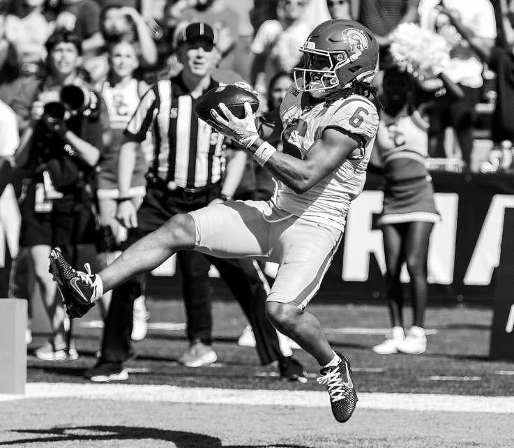 Previously unbeaten Trojans lose to the Illini on final play