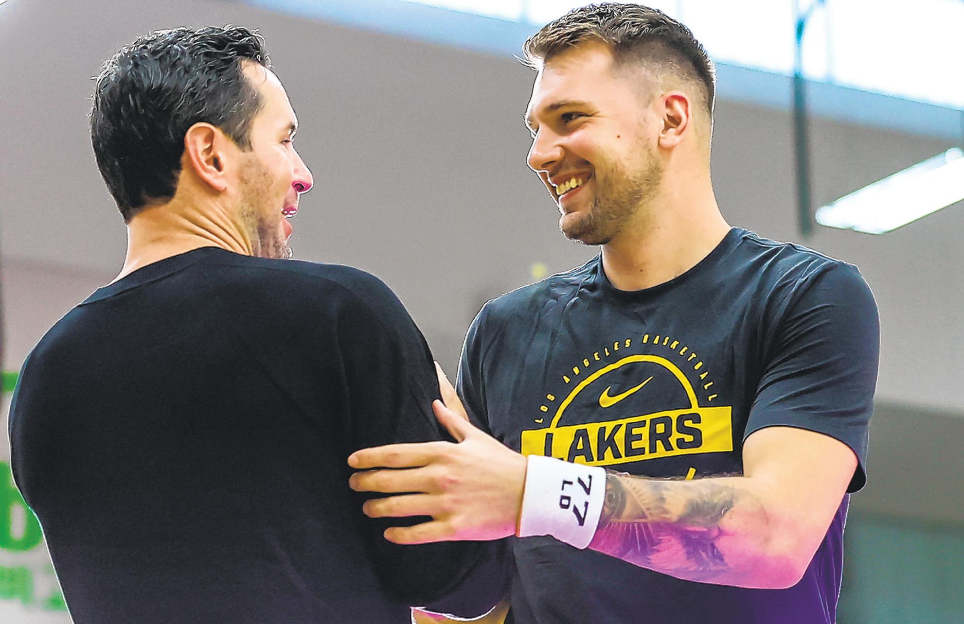 Doncic eases into camp after hectic offseason