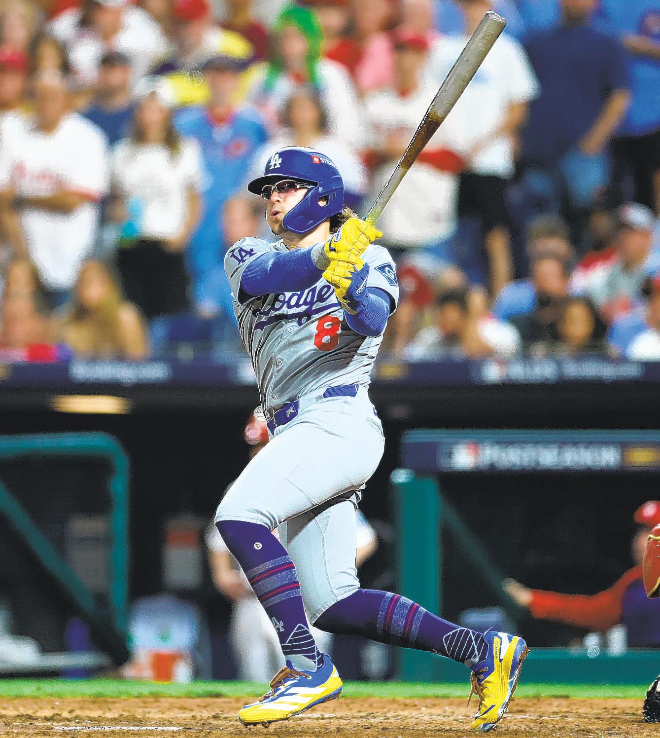 Dodgers conquer deficit and hostile environment to win series opener