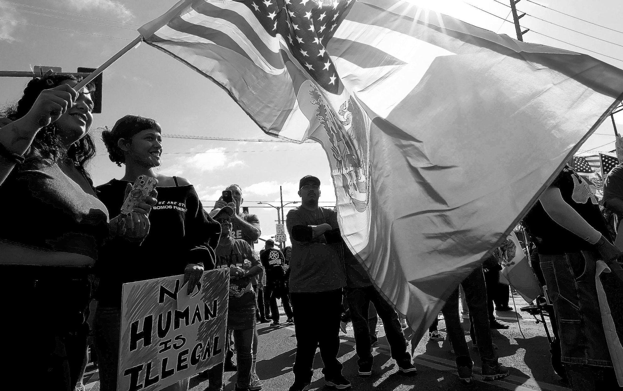 Hundreds call for end to ICE raids