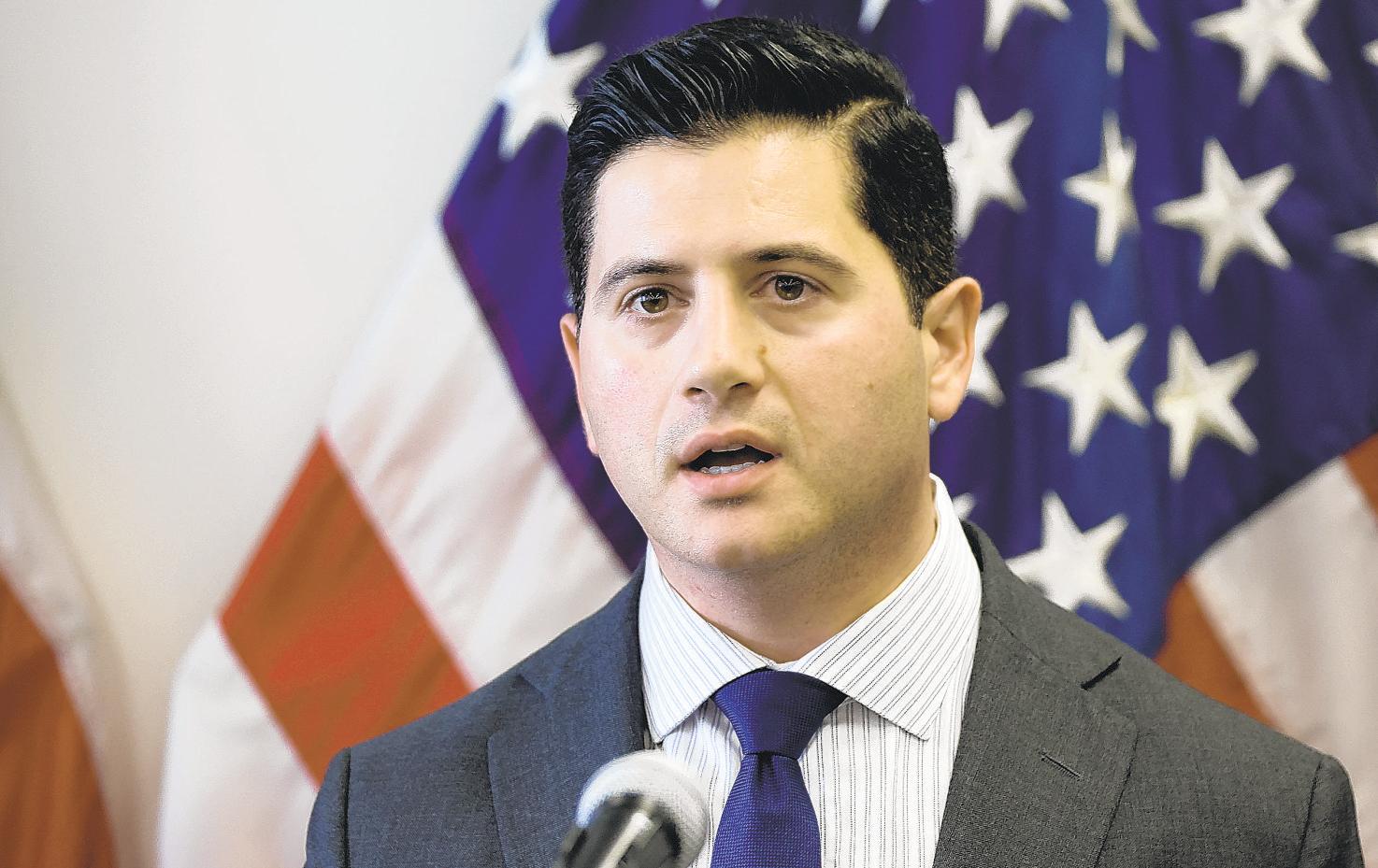 Real estate executives charged with defrauding program