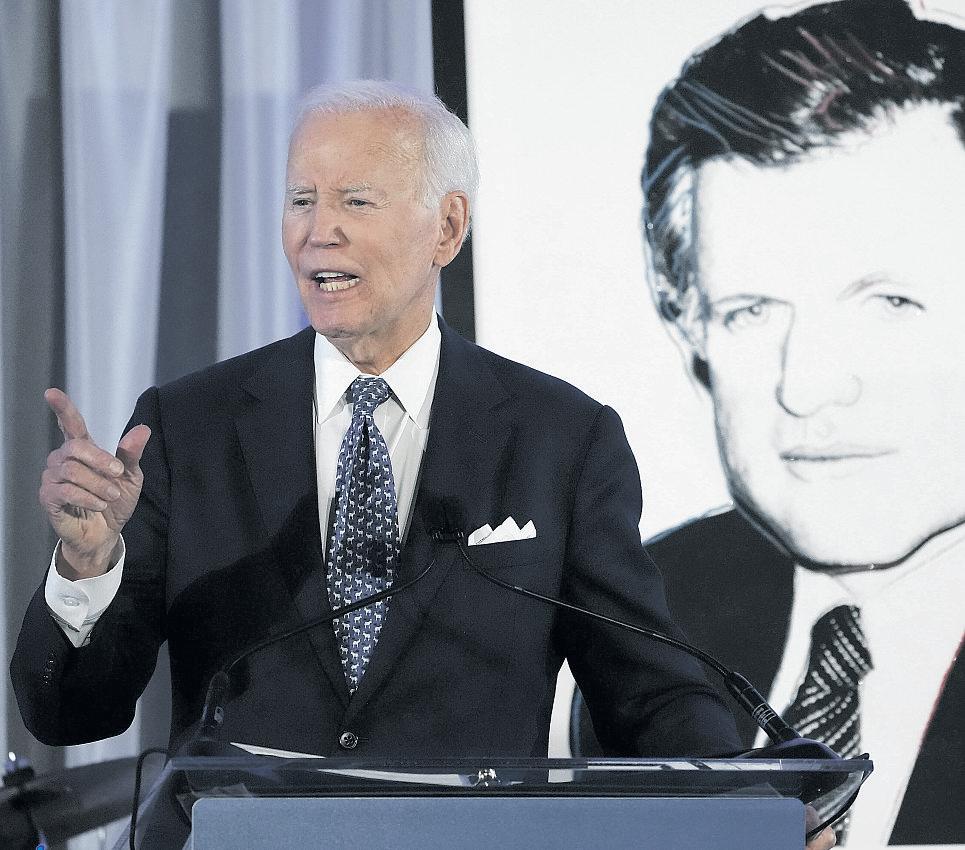 Biden warns of dark days but urges optimism