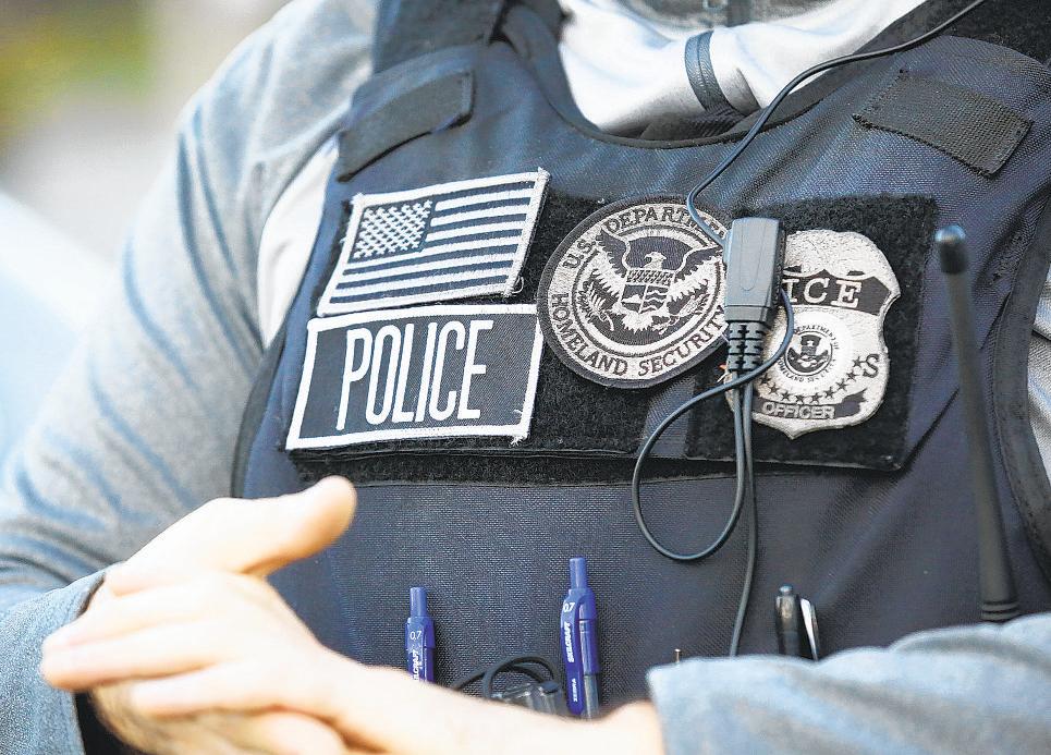 Man pointing gun at female driver is ICE agent