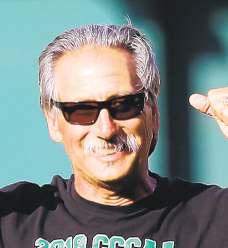 Former football coach is fatally shot on campus