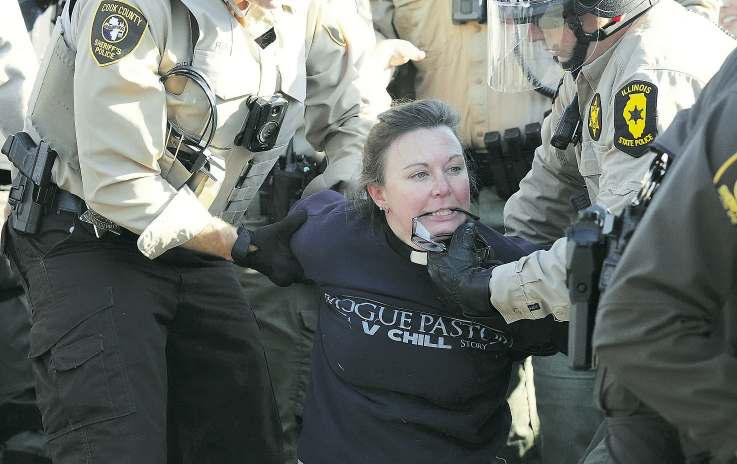 Chicago-area protesters held amid clashes